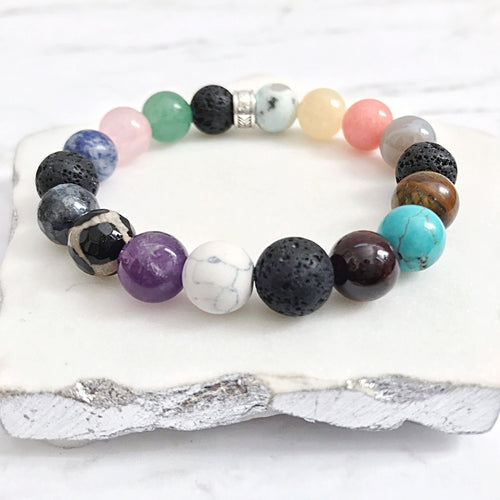 GET BALANCED:  Chakra gemstone + lava bead diffuser bracelet
